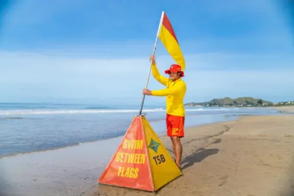 Swim between the flags. 
